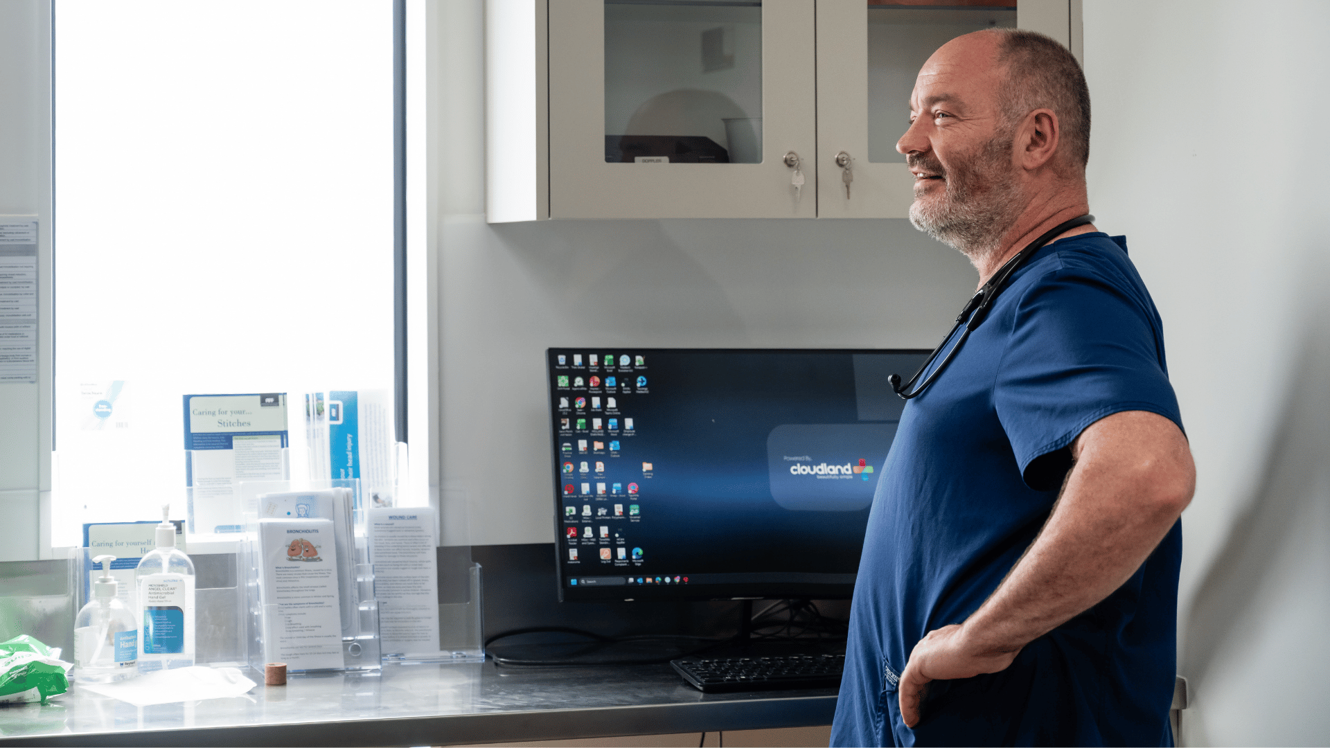 Male paramedic near computer