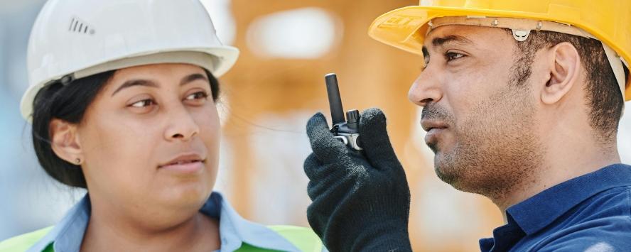 Two construction workers talking about H&S