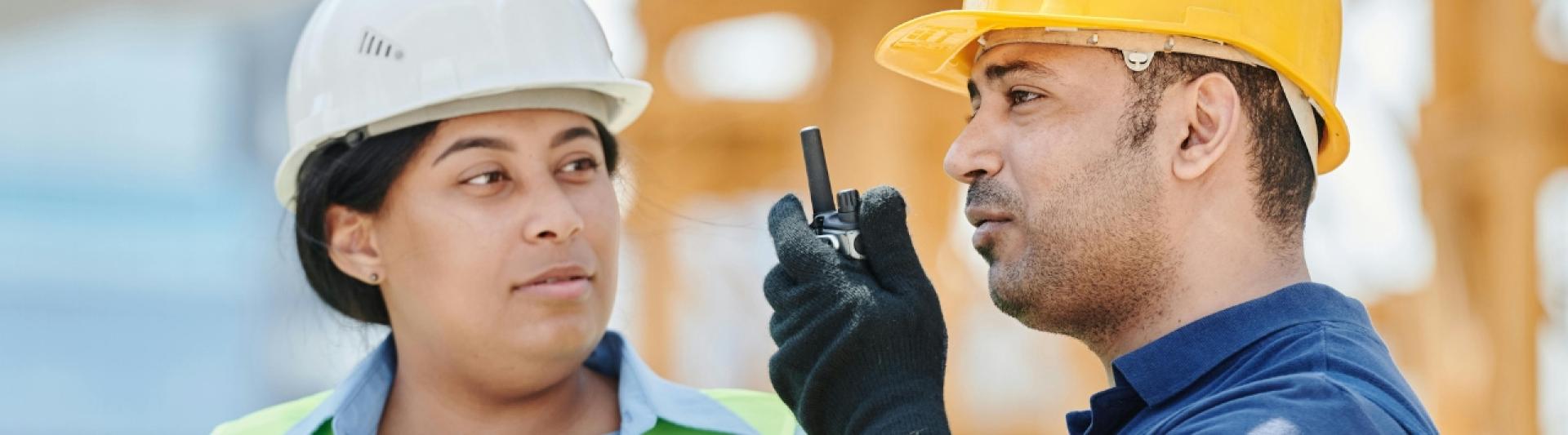 Two construction workers talking about H&S