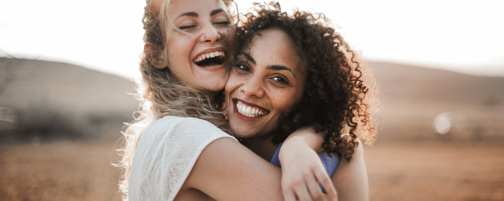Two women hugging