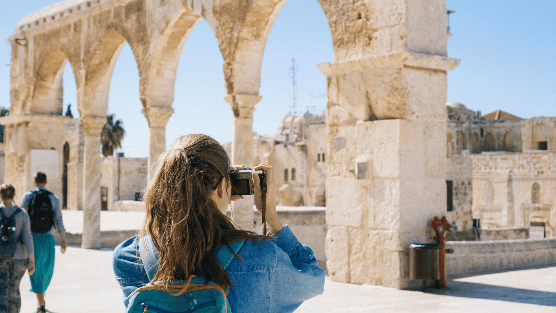 Woman taking picture of landmark