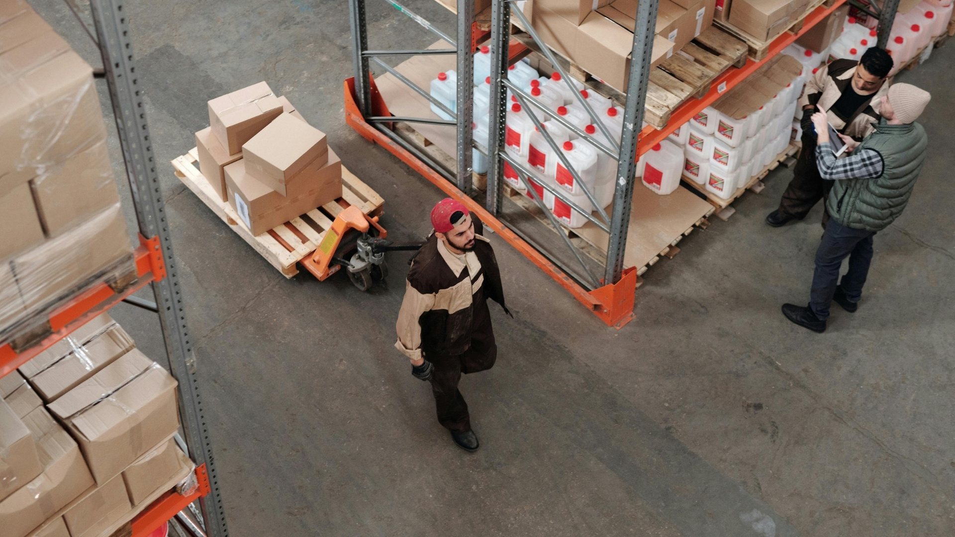 Worker in depo packing items