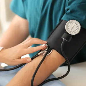 Patient getting blood pressure check at The Doctors