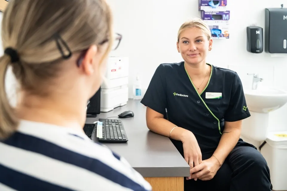 Woman with friendy nurse at The Doctors