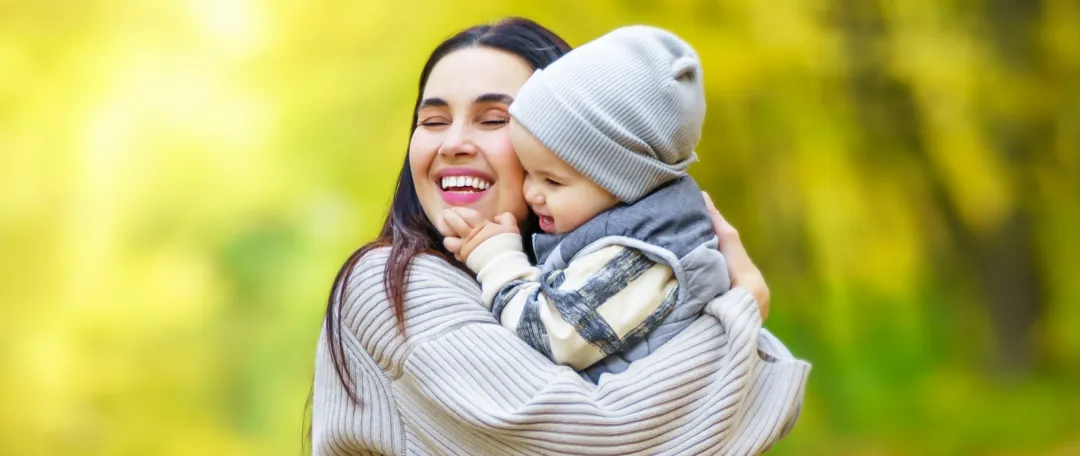 Baby hugging Mum after being unwell