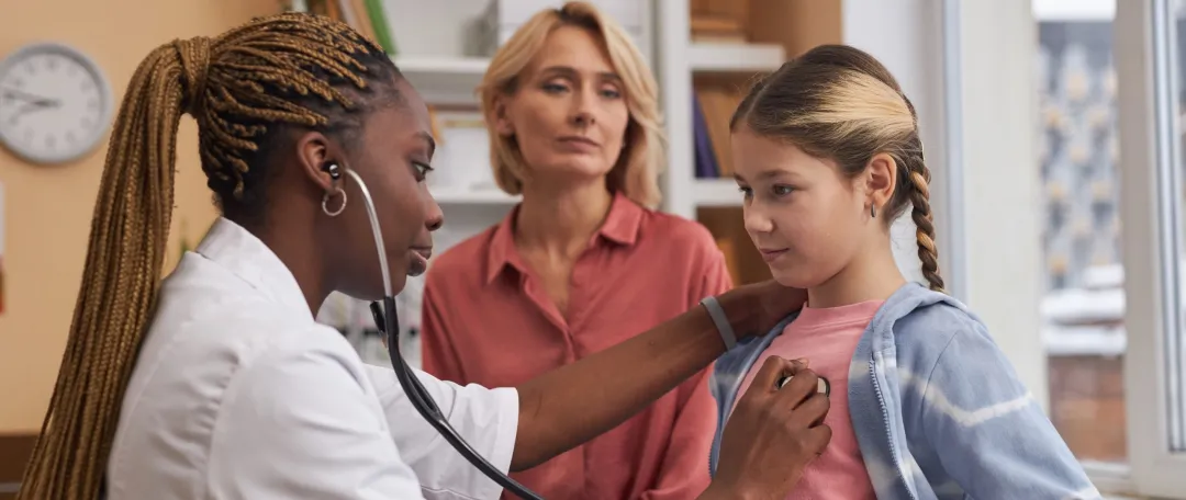Child getting lung checked with GP at The Doctors