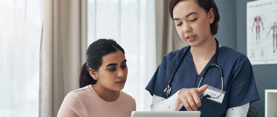 GP discussing sexual health with a patient at The Doctors